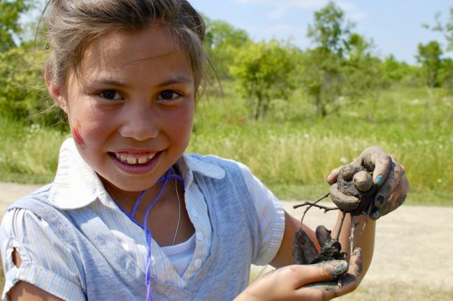 Young children don't need any special materials or toys for joyful, creative play. Photo courtesy of Emilian Geczi