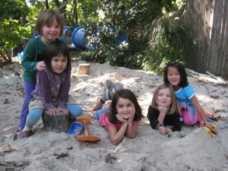 Photo by Lesley Romanoff, Takoma Park Cooperative Nursery School Children play outside every day, rain or shine.